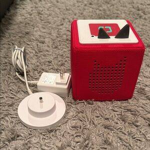 Red Tonie Box 1 with plug-in charging base